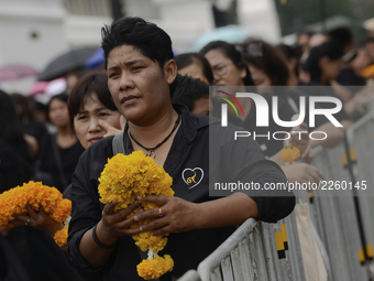 Thai Mourners in line to pay respect to the late Thai King Bhumibol Adulyadej outside the Grand Palace in Bangkok, Thailand, 13 October 2017...