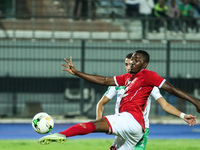 Egypt's Al Ahly footballer Oluwafemi Ajayi known as Junior Ajayi in action  during the Egypt Premier League match between Al-Ahly Sporting C...