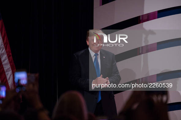 President Donald Trump enters the stage to speak at the 2017 Values Voter Summit, at the Omni Shoreham Hotel in Washington, D.C., on Friday,...