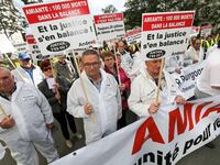 Protestors from the National Association for the Defense of Victims of Asbestos (ANDEVA) and from others associations demonstrate to pass ju...