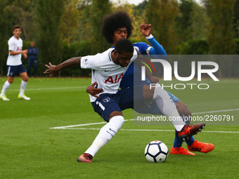 Japhet Tanganga of Tottenham Hotspur Under 23s holds of Hamza Choudhury of Leicester City Under 23s 
during Premier League 2 Div 1 match bet...