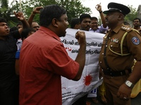 Sri Lankan Tamil activists shout slogans demanding the release of Tamil political prisoners at Jaffna, Northern province, Sri Lanka on Frida...