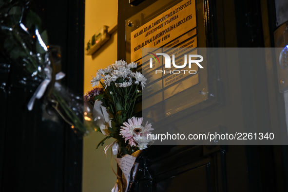 Lawyers of Athens gather at the office of the late Michael Zafeiropoulos in Athens on October 13, 2017. The lawyer was murdered in his offic...