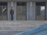 A North Korean soldier stands guard in the border village of Panmunjom between South and North Korea at the Demilitarized Zone (DMZ) on Octo...
