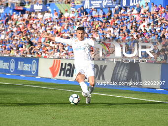 Real Madrid's Portuguese forward Cristiano Ronaldo in action during the Spanish league football match Getafe CF vs Real Madrid CF at the Col...