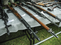 Rifles are seen on display for the public during NATO day on October 14, 2017. (