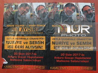 A photo taken in Ankara, Turkey on October 15, 2017 shows that a flyer posted on an advertising billboard summons people to the trial  on Oc...