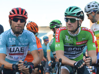 Diego Ulissi from UAE Team Emirates and Sam Bennett from Bora–Hansgrohe at the start to the the final sixth stage - the 143.7km Salcano Ista...