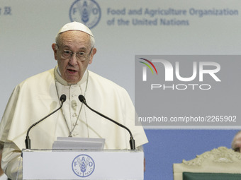 Pope Francis delivers his speech during the World Food Day at the United Nations Food and Agriculture Organization (FAO) Headquarter in Rome...