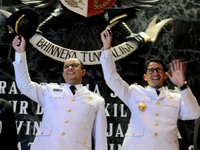  The new Governor of DKI Jakarta Anies Baswedan (left) and Vice Governor of DKI Jakarta Sandiaga Uno (right)  happy to be inaugurated and he...