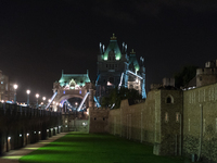 View the Tower of London by night, against the backdrob of the Tower Bridge London on October 16, 2017.  (