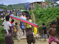 Rohingya refugee walks at the Unchiprang makeshift Camp in Cox's Bazar, Bangladesh, on September 07, 2017. According to the United Nations H...