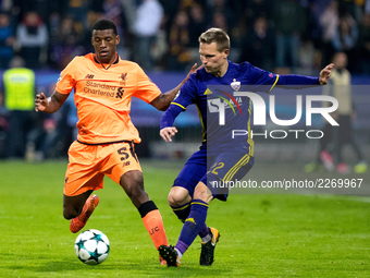  Martin Miller of NK Maribor (R) competes with Georginio Wijnaldum of  Liverpool FC  (L) during the UEFA Champions League match between NK M...