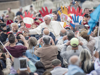 Pope Francis greets faithful during traditional wednesday general audience in St. Peter Square, Vatican, 18 october 2017.  (