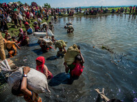 A Large number of rohingya muslims are attempting to cross Bangladeshi borderside at Palongkhali in Cox’s Bazar, Bangladesh on October 16 ,...