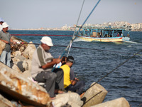 Palestinian fishermen set off for the sea in Gaza City on October 18, 2017 on the first day that fishermen will be allowed by Israel to trav...