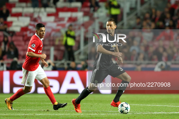 Manchester United's Serbian midfielder Nemanja Matic (R ) vies with Benfica's Mexican forward Raul Jimenez during the UEFA Champions League...