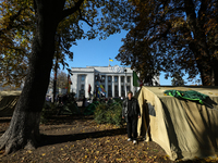 A man who participate a protest, stand near his tent at a camp in front of Ukrainian Parliament in Kyiv, Ukraine, Oct.18, 2017. Dozens Ukrai...