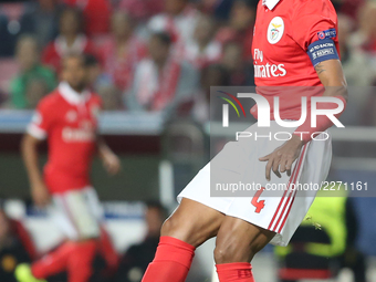 Benfica's Brazilian defender Luisao in action during the UEFA Champions League football match SL Benfica vs Manchester United at the Luz sta...
