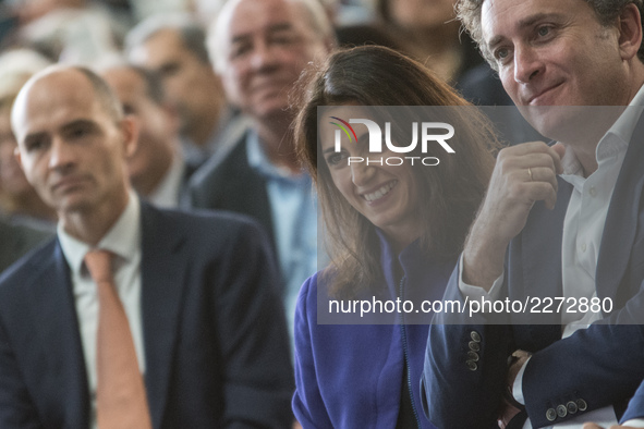 Virginia Raggi (C), Mayor of Rome, and Alejandro Agag, (R), CEO of Formula E Holdings Ltd., attend a press conference in Rome, Italy on Octo...