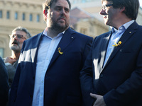 Catalan regional president Carles Puigdemont (R) and Catalan regional vice-president and chief of Economy and Finance Oriol Junqueras attend...