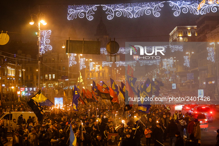Supporters and members of different far right nationalistic movements and parties participate an annual torch march downtown Kyiv confined t...