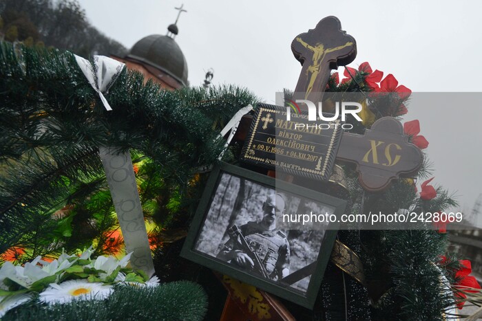 A view of a grave of Victor Matiuchin, a fallen soldier of the Ukrainian Army who died on December 4, 2017, during the War in Donbass area (...