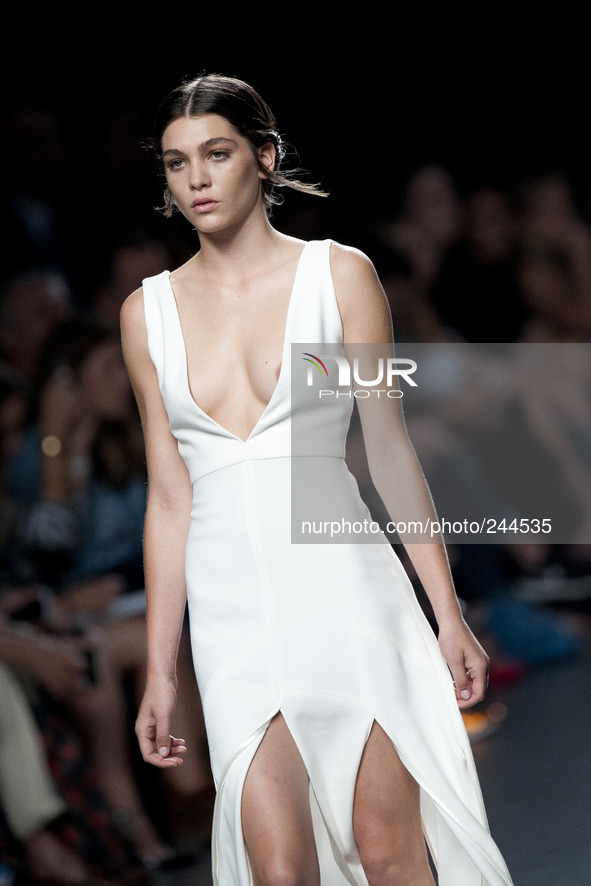 Model parades a design Juanjo Oliva  ,first day of the 60th Mercedes-Benz FashionWeek Madrid (MBFWM) in Madrid,  Spain, 12 September 2014. M...