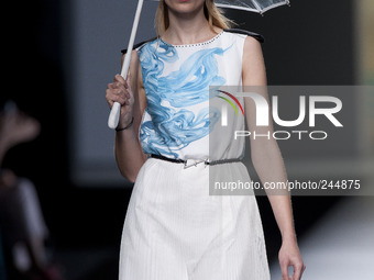 A model showcases designs by Ion Fiz on the runway at Ion Fiz show during Mercedes Benz Fashion Week Madrid Spring/Summer 2015 at Ifema on S...