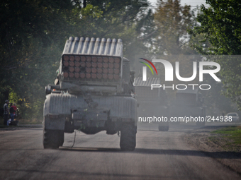 LUGANSK, UKRAINE - SEPTEMBER 12: A BM-21 rocket launcher on the road in Lugansk region (Photo by Sergii Kharchenko/NurPhoto)