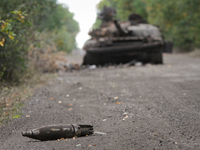 LUGANSK REGION, UKRAINE - SEPTEMBER 13: Destroyed by pro-russian terrorists Ukrainian main battle tank is seeing on the road from Shchastya...