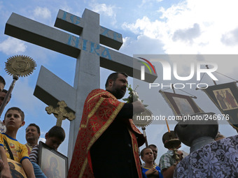Bulgarian pilgrims and Orthodox priests attend an open air mass and pray in front of giant holy cross at the holy cross place in Asparuhovo...