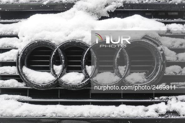 Snowflakes are seen on the badge of a Audi car in Warsaw, Poland February 8, 2018. 