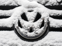 Snowflakes are seen on the badge of a Volkswagen car in Warsaw, Poland February 8, 2018. (