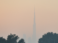 A view of Burj Khalifa and Dubai center covered by fog during a winter sunset.  On Thursday, February 8, 2018, in Dubai, United Arab Emirate...
