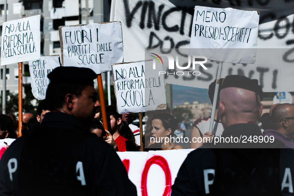 Workers gathered to protest over employment rights as Italian prime minister Matteo Renzi celebrates the inauguration of the academic year i...