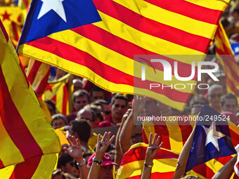 National Day of Catalonia, People wave flags during a demonstration calling for the independence of Catalonia in Barcelona, Spain,  Sept 11,...