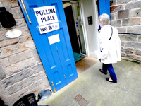 Voters walk into the Stockbridge Parish to cast a vote on the Scottish referendum. Many people have objected to polling places being held in...