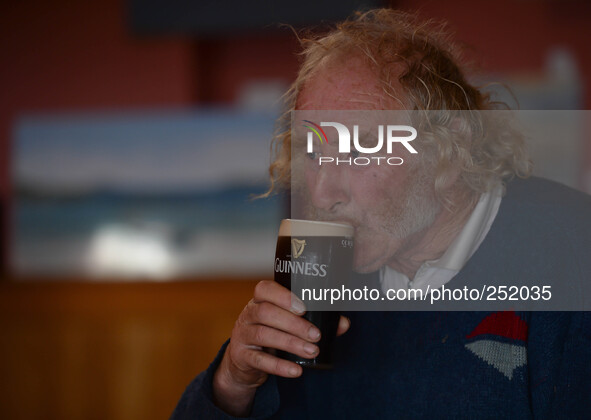 A local man enjoys his pint of Guinness in Cleggan's Pub. Connemara, County Galway, Ireland. Photo: Artur Widak /NurPhoto 