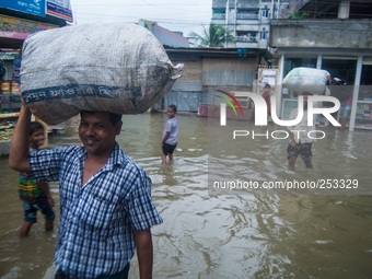 Heavy rains in Dhaka, the capital of Bangladesh, on September 20, 2014. Due to poor drainage system the low lying area of Dhaka is now facin...