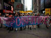 NEW YORK - Demonstrators of the People's Climate March paraded the New York City streets on Sunday, September 21, 2014. Headed by the U.N. S...