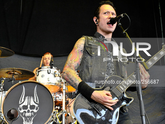 Mat Madiro (L) and Matt Heafy with Trivium perform during the Rockstar Energy Drink Mayhem Festival at The Cynthia Woods Mitchell Pavilion o...