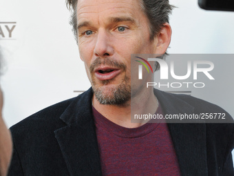 Ethan Hawke poses on the red carpet at the launch party for Austin Way Magazine at Arlyn Studios on September 21, 2014 in Austin, Texas. (