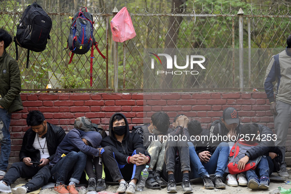 Nepalese Youths sleeping in a line in the early morning to pay the amount for the application submission for the Korean Language Test (KLT)...