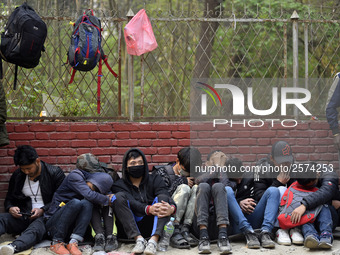 Nepalese Youths sleeping in a line in the early morning to pay the amount for the application submission for the Korean Language Test (KLT)...