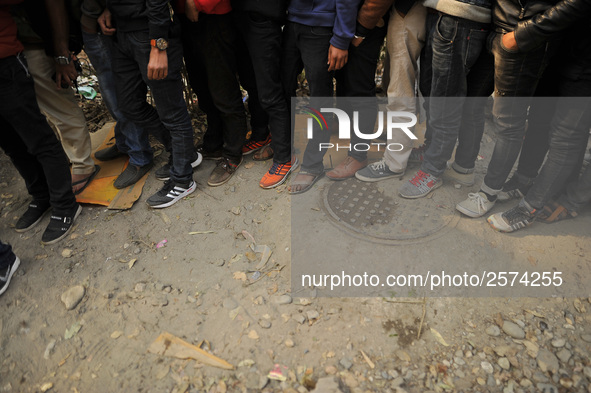 Foots of Nepalese Youths seen as line up to pay the amount for the application submission for the Korean Language Test (KLT) under the Korea...