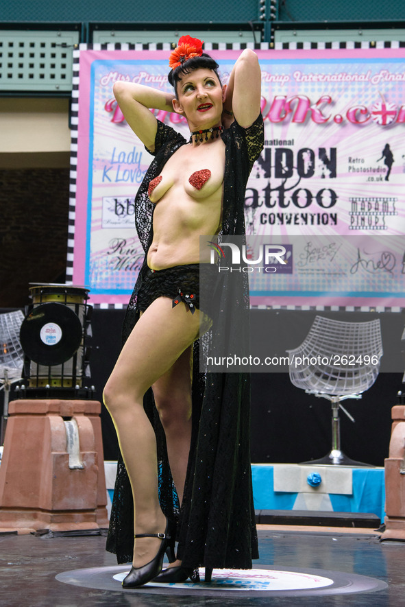 The 10th International London Tattoo Convention on 26/09/2014 at Tobacco Dock, London. Burlesque performer on the Pin-Up stage. Picture by J...