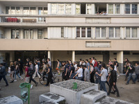Students gather in front of the Paris Tolbiac university campus on April 20, 2018 in Paris after riot police evacuated the university in the...
