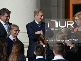 Taoiseach Enda Kenny (center), Minister of State for EU Affairs and Data Protection Dara Murphy (left) and the Minister for Education & Skil...