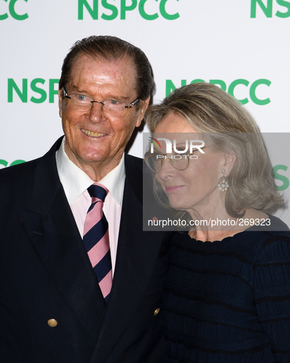 Sir Roger Moore attends the A NIGHT OUT WITH SIR MICHAEL CAINE on 01/10/2014 at Royal Albert Hall, London. Persons pictured: Sir Roger Moore...
